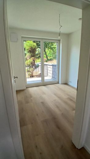 Construction neuve – Première occupation | Appartement duplex de 2 pièces | Terrasse sur le toit | Cuisine équipée – Schlafzimmer
