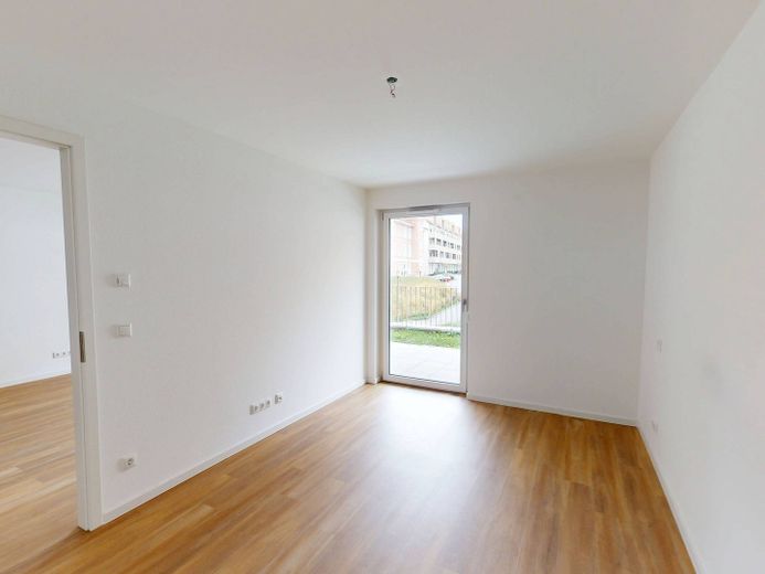 2-kamer-nieuwbouwwoning met TERRAS en ingerichte keuken op loopafstand van het Kurpark – Ansicht I: Schlafzimmer
