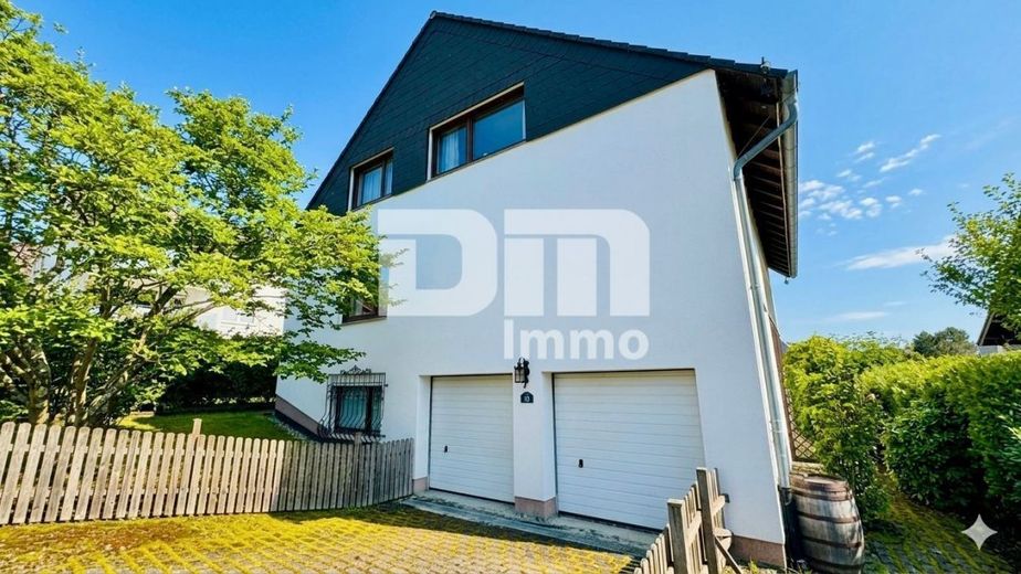 Gepflegtes 1 bis 2 Familienhaus in gesuchter Ortsrandlage mit Panoramablick – Titel Frontansicht