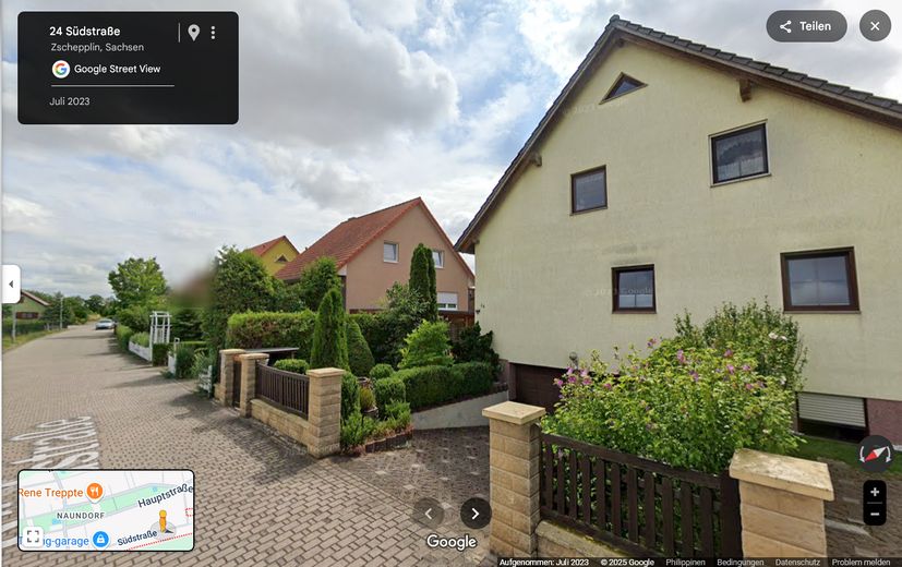 Straßenseite Einfahrt TG 