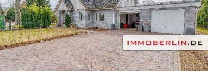 IMMOBERLIN.DE - Großzügiges Haus mit möglicher Gewerbeeinheit in ländlicher Lage