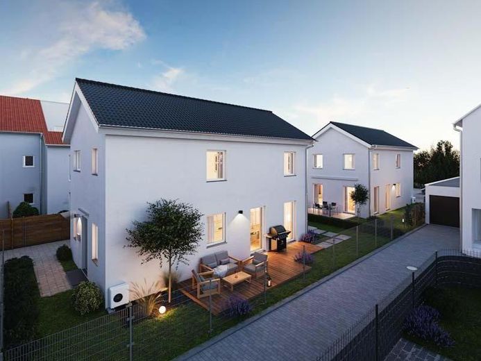 Kompaktes Stadthaus in kleinem Neubaugebiet mit eigenem Garten und Top-Anbindung in Worms-West – Hausansicht West