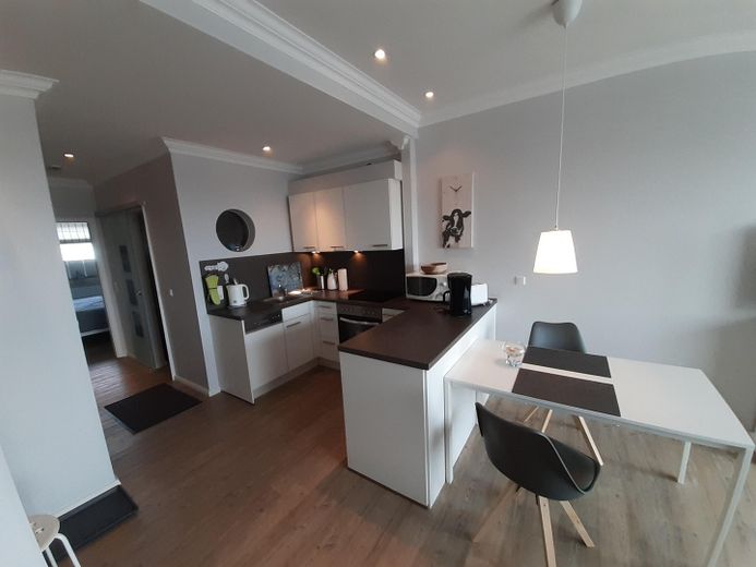 ##Reserviert## Sonnige 2-Zimmer Ferienwohnung mit Meerblick – Küche mit Essecke