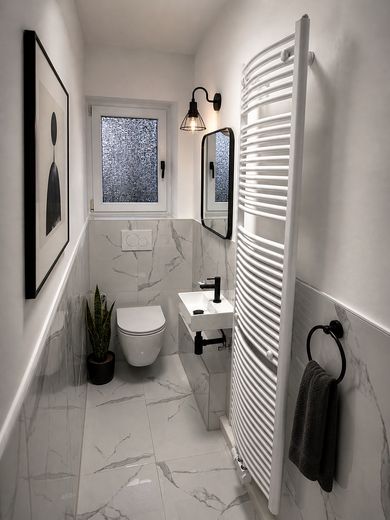 Frisch renovierte 3-Zimmer-Wohnung mit Südbalkon, Garage & Top-Potenzial – WC möbliert