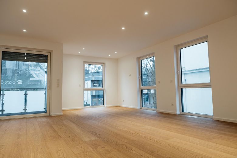 Mehr Raum für Ihre Träume: A+ 2-Zimmer-Traum im Herzen von Hamm! Aufzug, Balkon & Premium-Design – Wohnzimmer