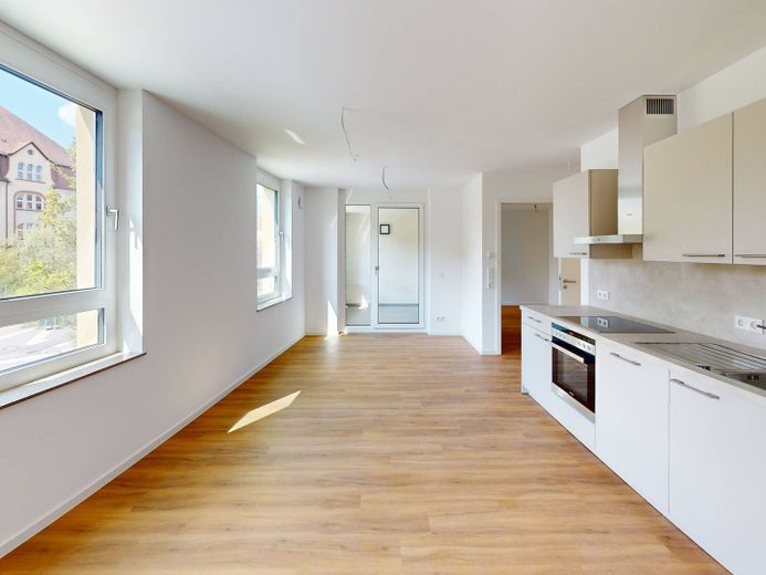 First occupancy: Ultra-modern 3-room new-build apartment with fitted kitchen and loggia in eastern Nuremberg – Ansicht I: Wohn- und Esszimme…
