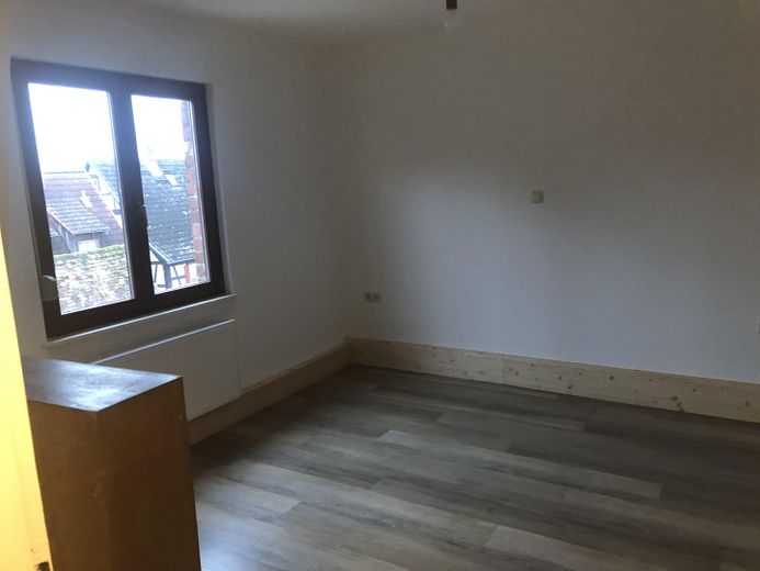 Charming apartment on the 2nd floor of a half-timbered house in the old town of Windecken – Schlafzimmer