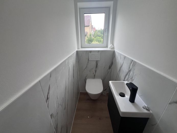 Erstbezug Möhringen: Stilvolle 3,5-Zi.-Etagenwohnung mit Kamin, Balkon & Garten – Gäste-WC