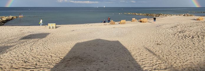 Regenbogen am Strand