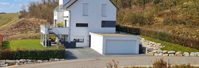 WeberHaus – Individuell geplantes KfW-40-Plus Designhaus mit Einliegerwohnung & Photovoltaik