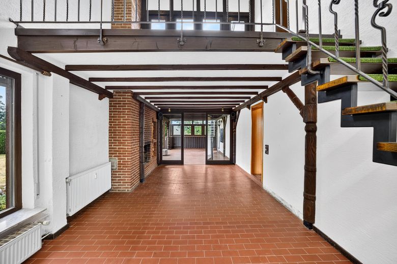 Großzügiges Wohnen mit schönem Garten – Einfamilienhaus mit Einliegerwohnung – Kaminzimmer