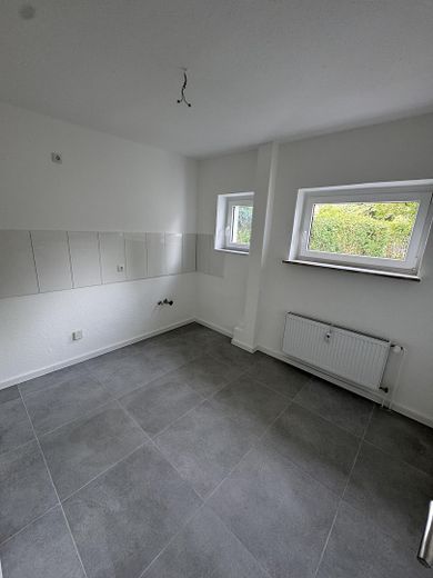 Renovierte 3,5 Zimmer EG Wohnung mit Garten – Küche