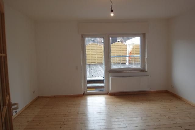 Wohnzimmer mit Ausgang Terrass
