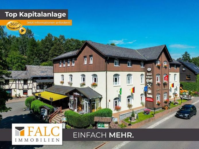 Traditionshotel in der Welthauptstadt der Holzkunst – फोटो 1