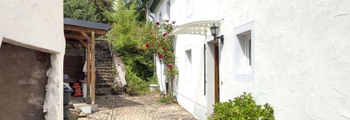 Herl: charmantes Einfamilienhaus mit schönem Außenbereich und Ausbaupotenzial