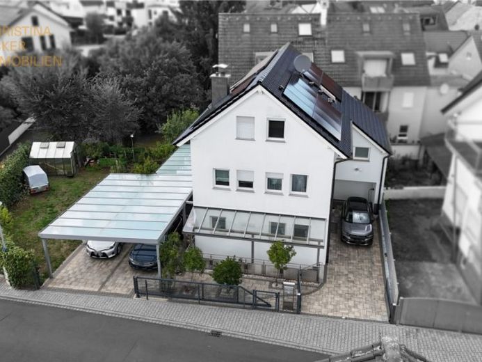 Rödermark Ober-Roden'de PV sistemi ve ayrı dairesi bulunan aile dostu müstakil ev – Fotoğraf 1