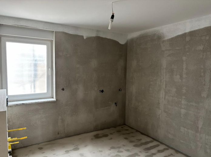 Appartamento con 3 locali al piano terra, vista mozzafiato, ampia terrazza + giardino – Wäschebereich Bad