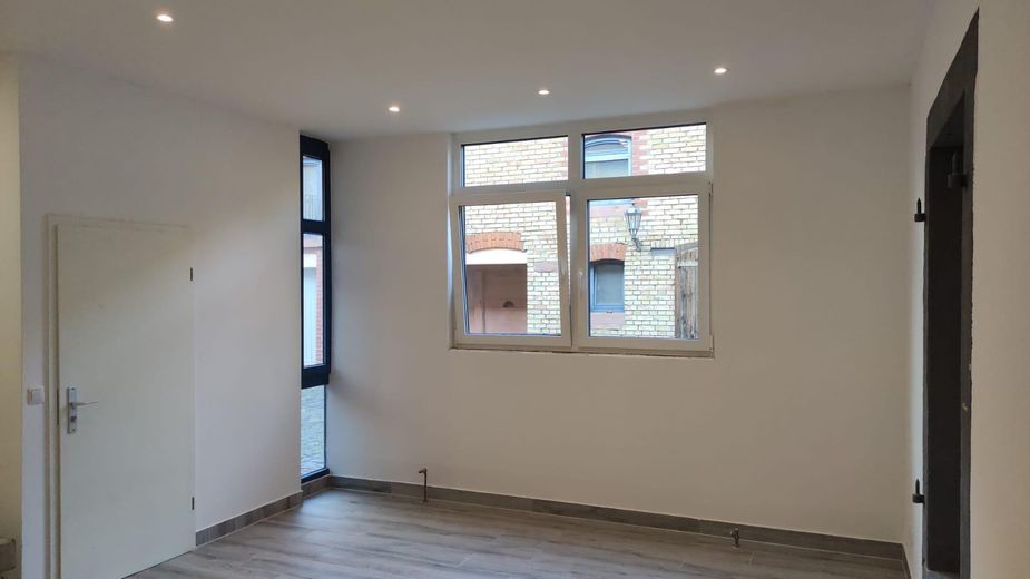 Gemütliche 1-Zimmer-Wohnung teilmöbliert mit Einbauküche barrierefrei – Ansicht Wohnbereich