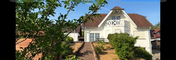 PROVISIONSFREI! Exklusives Einfamilienhaus in Guldental mit unverbaubarer Fernsicht – Gartenansicht