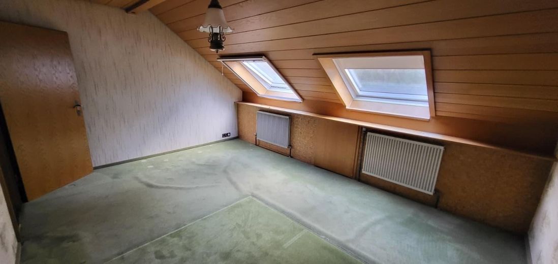 Architektenhaus in ausergewöhnlicher Alleinlage – Schlafzimmer OG
