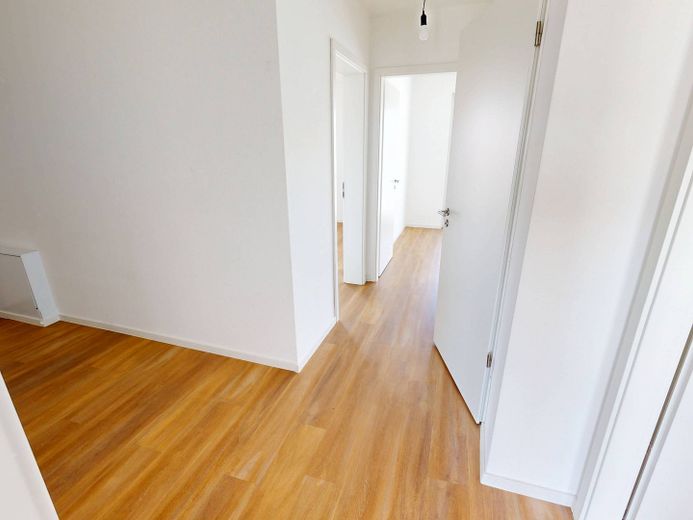 Moderniteit en comfort: nieuwbouwappartement met 4 kamers, inbouwkeuken en groot dakterras – Ansicht I: Flur