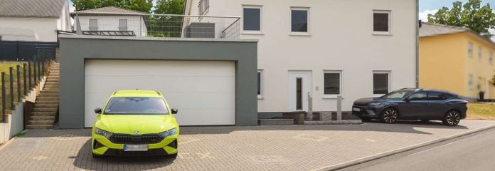 Bekond: Junges Einfamilienhaus, Wärmepumpe, Wintergarten und große Garage mit Platz für mehrere PKW