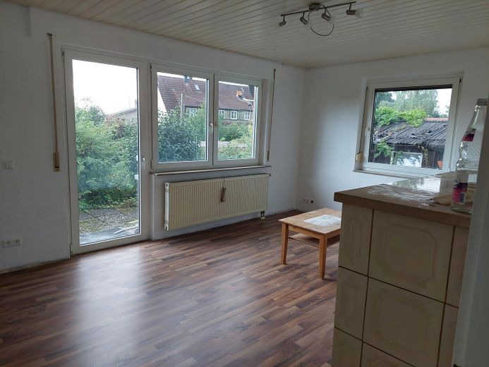 Ruhig gelegenes Einfamilien- / Zweifamilienwohnhaus mit sonnigem Garten – Wohnzimmer EG