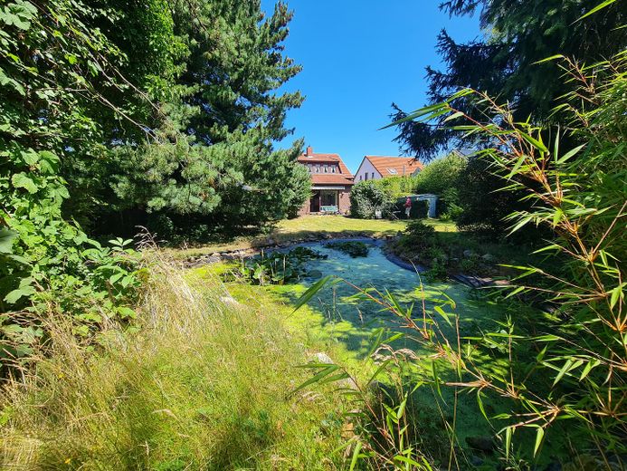 Provisionsfrei! Charmantes Einfamilienhaus in ruhiger Sackgasse im Herzen von Lilienthal – Von hinter dem Teich zum Haus