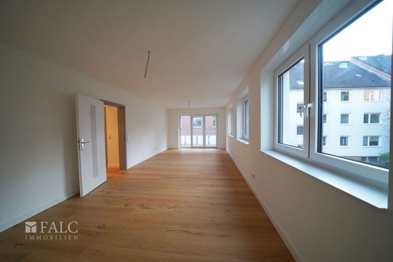 Energieeffizienter Neubau mit 3 Wohneinheiten und Business-Suite – WHG2-Wohnzimmer