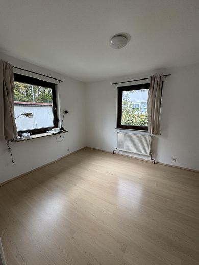 Vivienda bifamiliar en Stuttgart-Sillenbuch – EG Zimmer