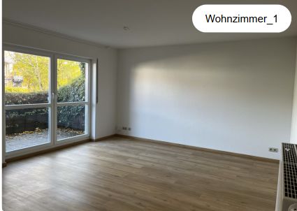 Exklusive 2-Raum Wohnung mit Terrasse/Garten, Stellplatz und EBK – Wohnzimmer
