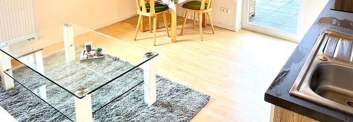 Wohnzimmer mit Wohnküche