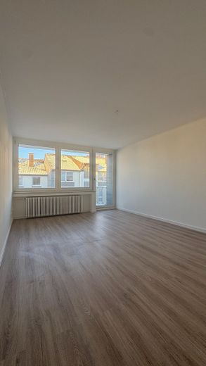 Wohnzimmer mit Balkon