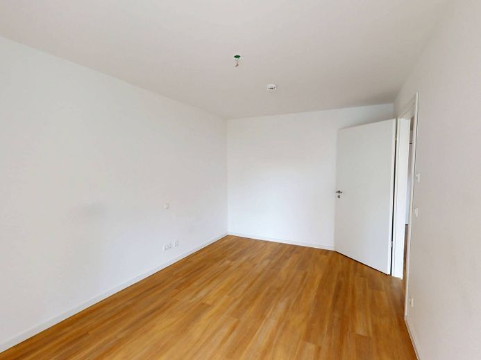 2-kamer-nieuwbouwwoning met TERRAS en ingerichte keuken op loopafstand van het Kurpark – Ansicht II: Schlafzimmer
