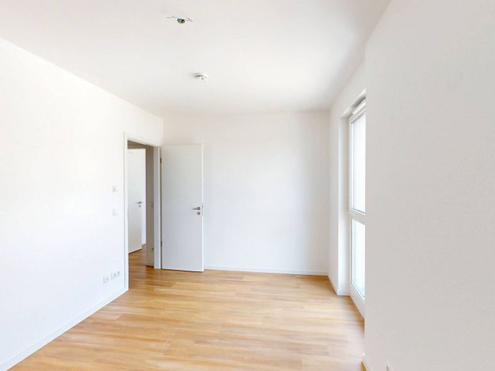 Moderniteit en comfort: nieuwbouwappartement met 4 kamers, inbouwkeuken en groot dakterras – Ansicht II: Schlafzimmer III