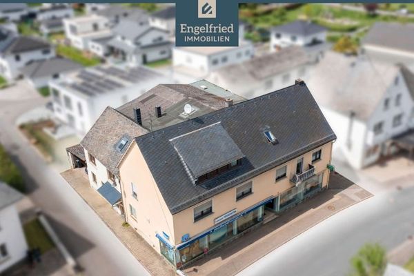 Profit-generating residential and commercial building in an up-and-coming municipality (13 times annual rent)