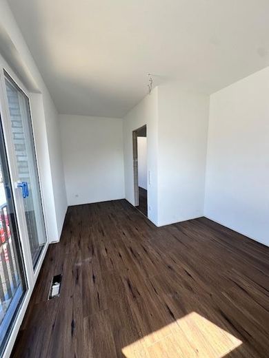 Großzügige helle Neubauwohnung im 1.OG eines Zweiparteienhaus in Verl – Kinderzimmer/Büro 