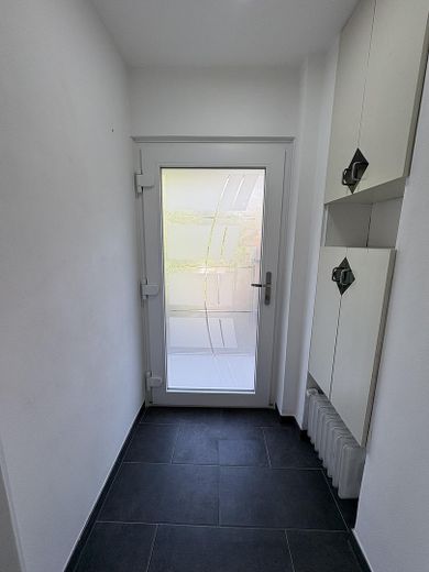 Zuhause fühlen in Reihenmittelhaus in ruhiger, familiärer Lage – Windfang