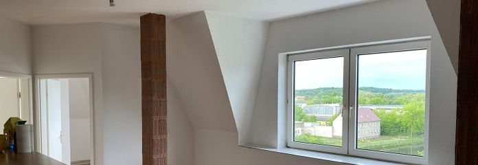 funktionale Dreiraumwohnung mit Einbauküche zentral und ruhig gelegen – Wohn- und Essbereich