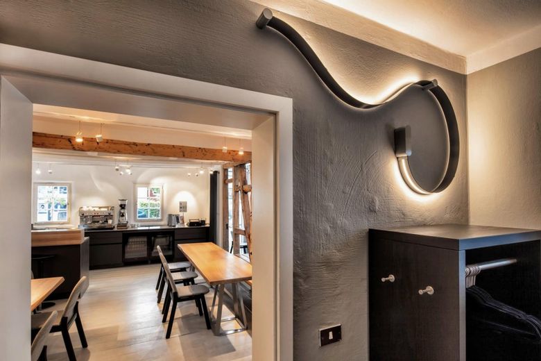 Die Buchmühle: Ubicación para eventos y negocios · Sala de exposición · Loft y diseño · Bienestar – Garderobe/Zugang Küchengarten