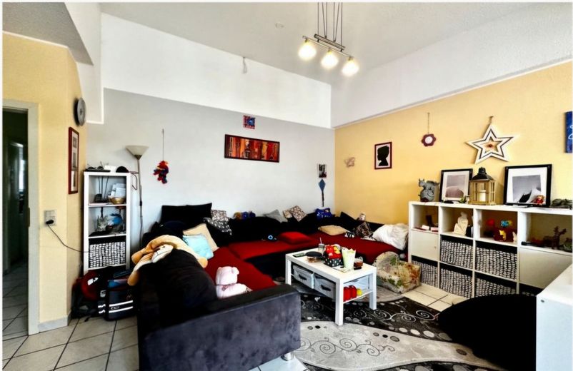 Reihenmittelhaus mit 2 Wohnungen im Sondereigentum – Wohnzimmer 3-Zi-Whg.