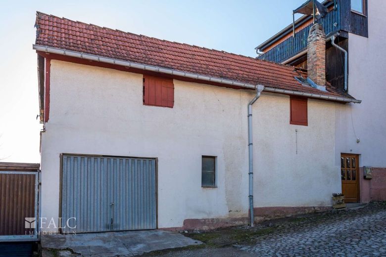 Wohnhaus mit 3 WE + Zimmervermietung – Nebengebäude m. Garage