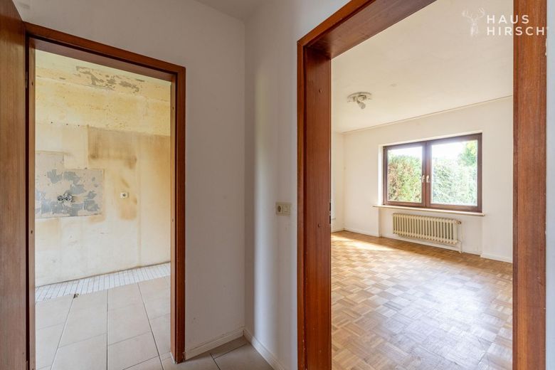 Doppelhaushälfte mit 5 Zimmern auf 133 m² in Boostedt zu kaufen – Schlafzimmer Küche