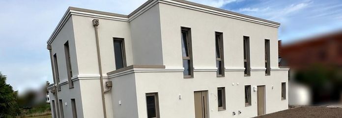 Перше заселення 2026 року: половина дуплексу на півдні Магдебурга — сад, камін, тепловий насос, 150 м², A+ – Doppelhaushälfte