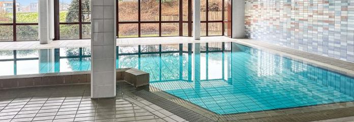 Gepflegte Eigentumswohnung mit Loggia, Stellplatz, Schwimmbad und Sauna in Travemünde