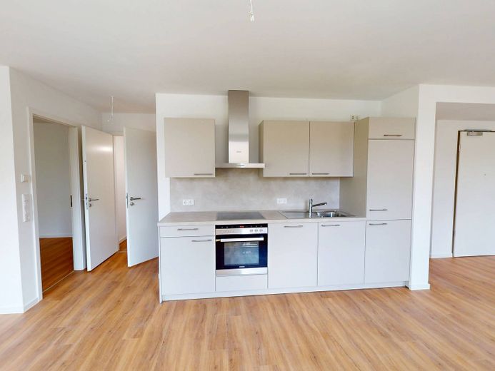 First occupancy: Ultra-modern 3-room new-build apartment with fitted kitchen and loggia in eastern Nuremberg – Ansicht III: Wohn- und Esszim…