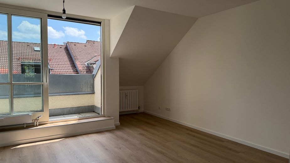 Erstbezug nach Sanierung im Herzen von Unterhaching – Wohnzimmer