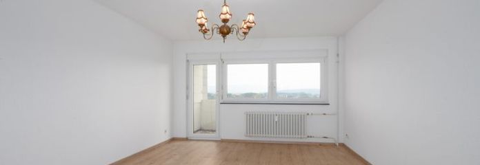 Aussicht genießen, Potenzial entfalten – 2 Zimmer mit Balkon & Garage