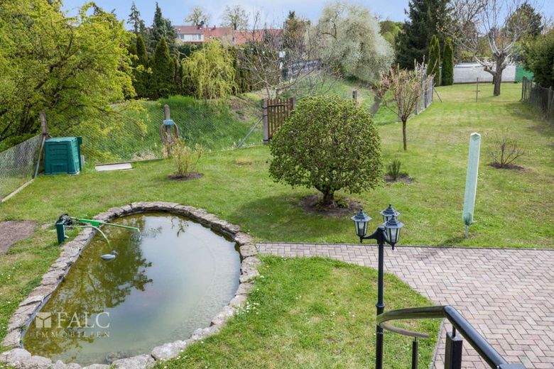 Hochwertige und sehr gepflegte DHH in Kölleda – Garten m. Teich