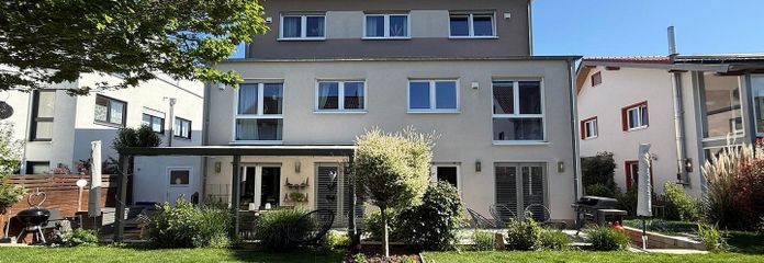 Raum zum Entfalten: Haus in Friedberg mit 120 Quadratmetern – Gartensicht-rechte Haushälfte